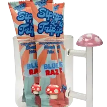 Three Blue Raz psilocybin drink mix packets in a mushroom cup