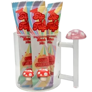 Three Sour Cherry psilocybin drink mix packets in a mushroom cup